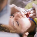 Kodėl profesionali dantų higiena kas 6 mėnesius apsaugo nuo brangaus gydymo: Vilniaus odontologų patirtis